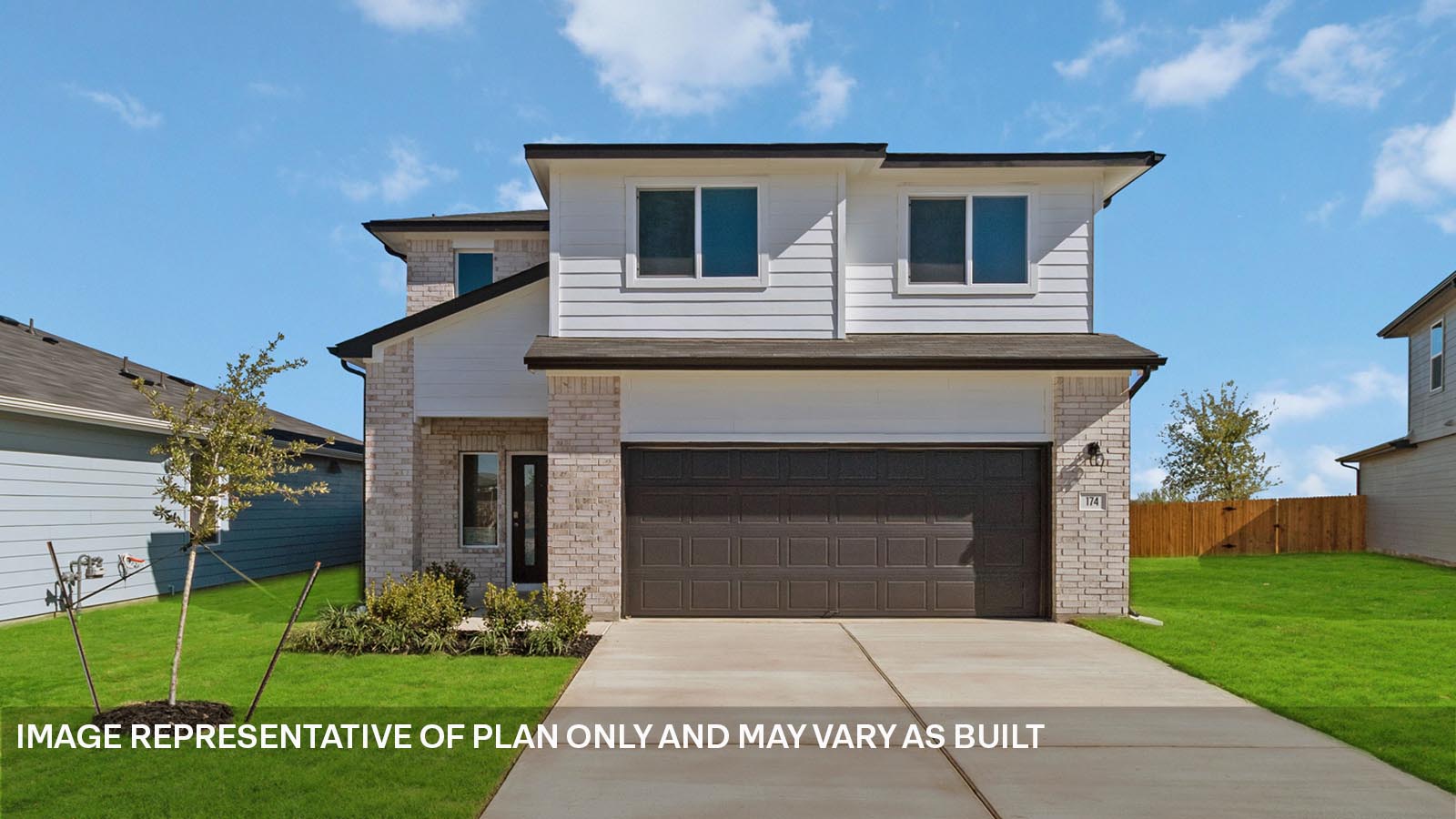 424 Mountain Pea Road Kyle, TX 78640 - Photo 2 of 25 a front view of a house with a garden