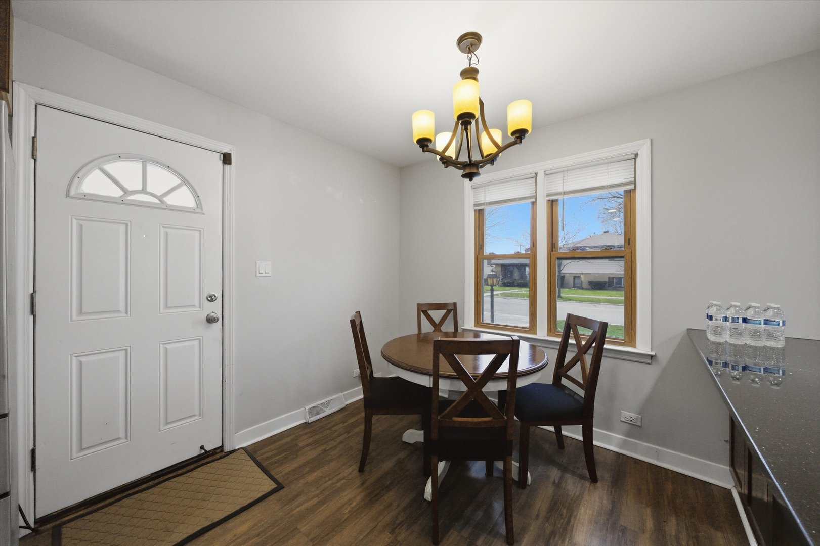 3841 Arthur Avenue Brookfield, IL 60513 - Photo 16 of 34 a view of a dining room with furniture window and wooden floor