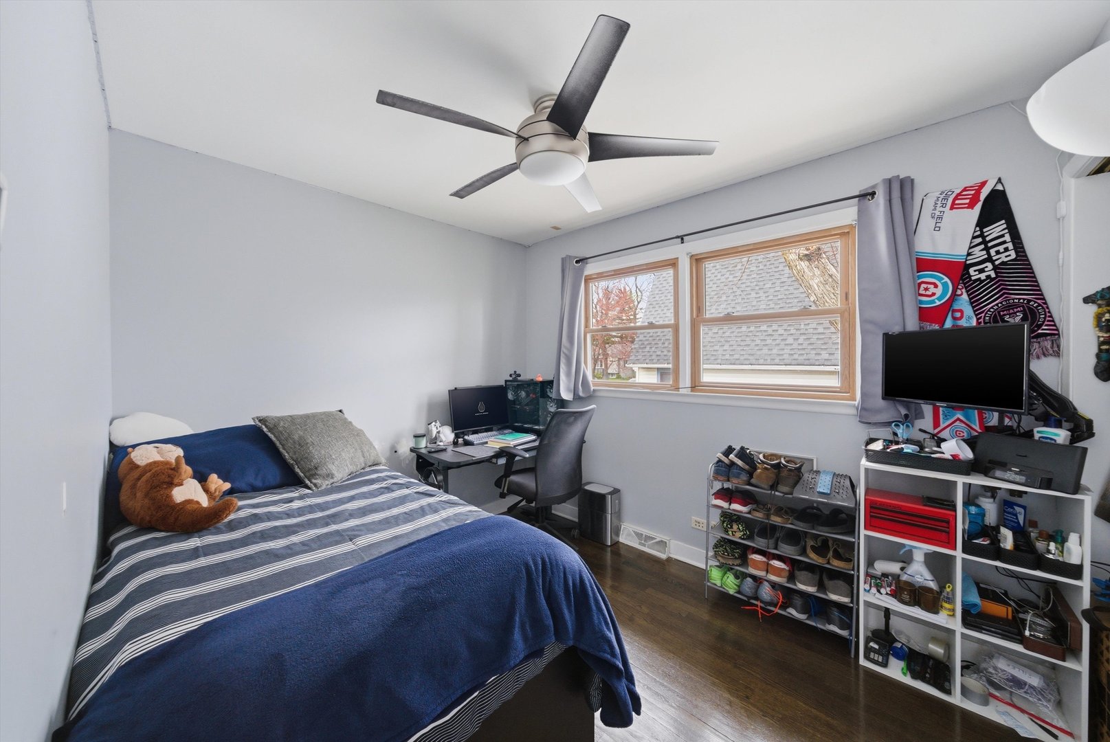 3841 Arthur Avenue Brookfield, IL 60513 - Photo 18 of 34 a bedroom with a bed and a flat screen tv
