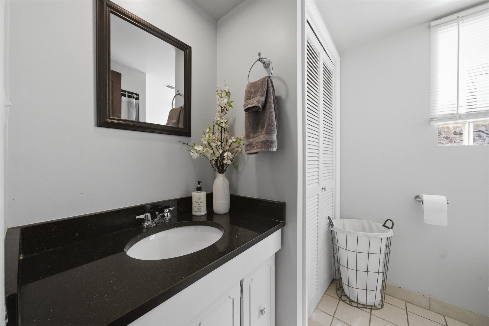 3841 Arthur Avenue Brookfield, IL 60513 - Photo 19 of 34 a bathroom with a sink and a mirror