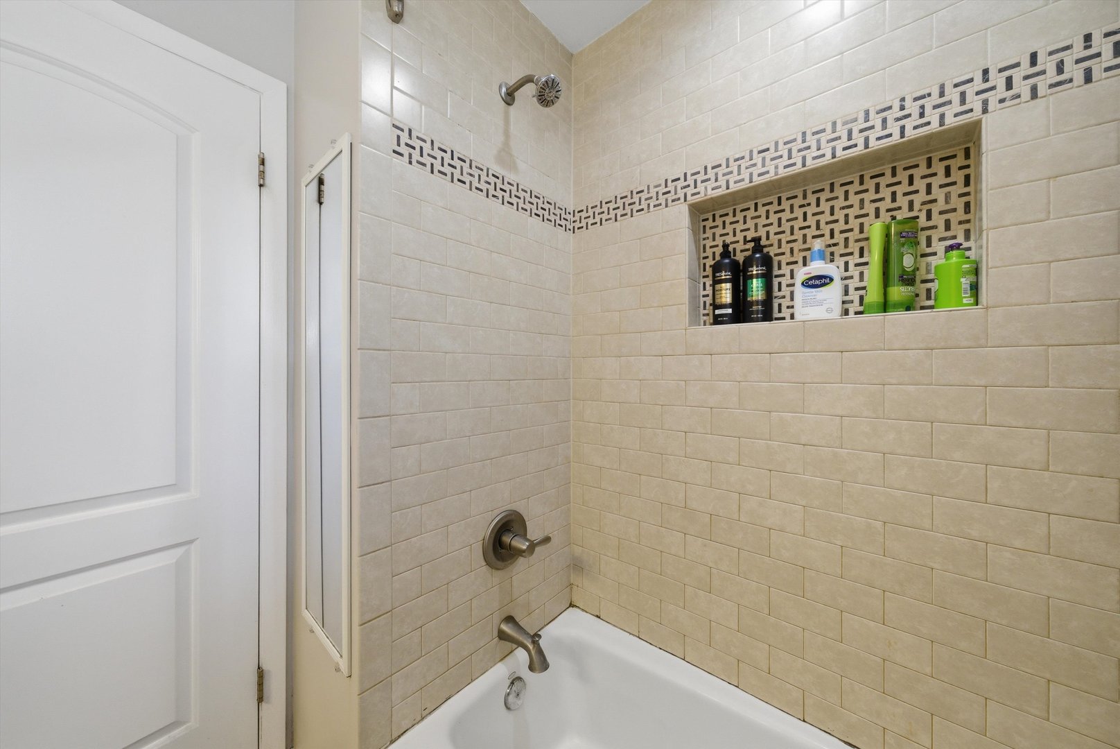 3841 Arthur Avenue Brookfield, IL 60513 - Photo 21 of 34 a bathroom with a shower and a tub