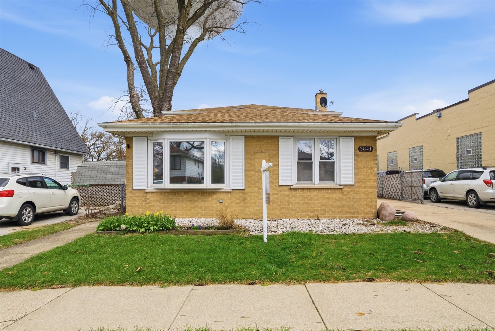 3841 Arthur Avenue Brookfield, IL 60513 - Photo 34 of 34 a front view of a house with a garden and yard