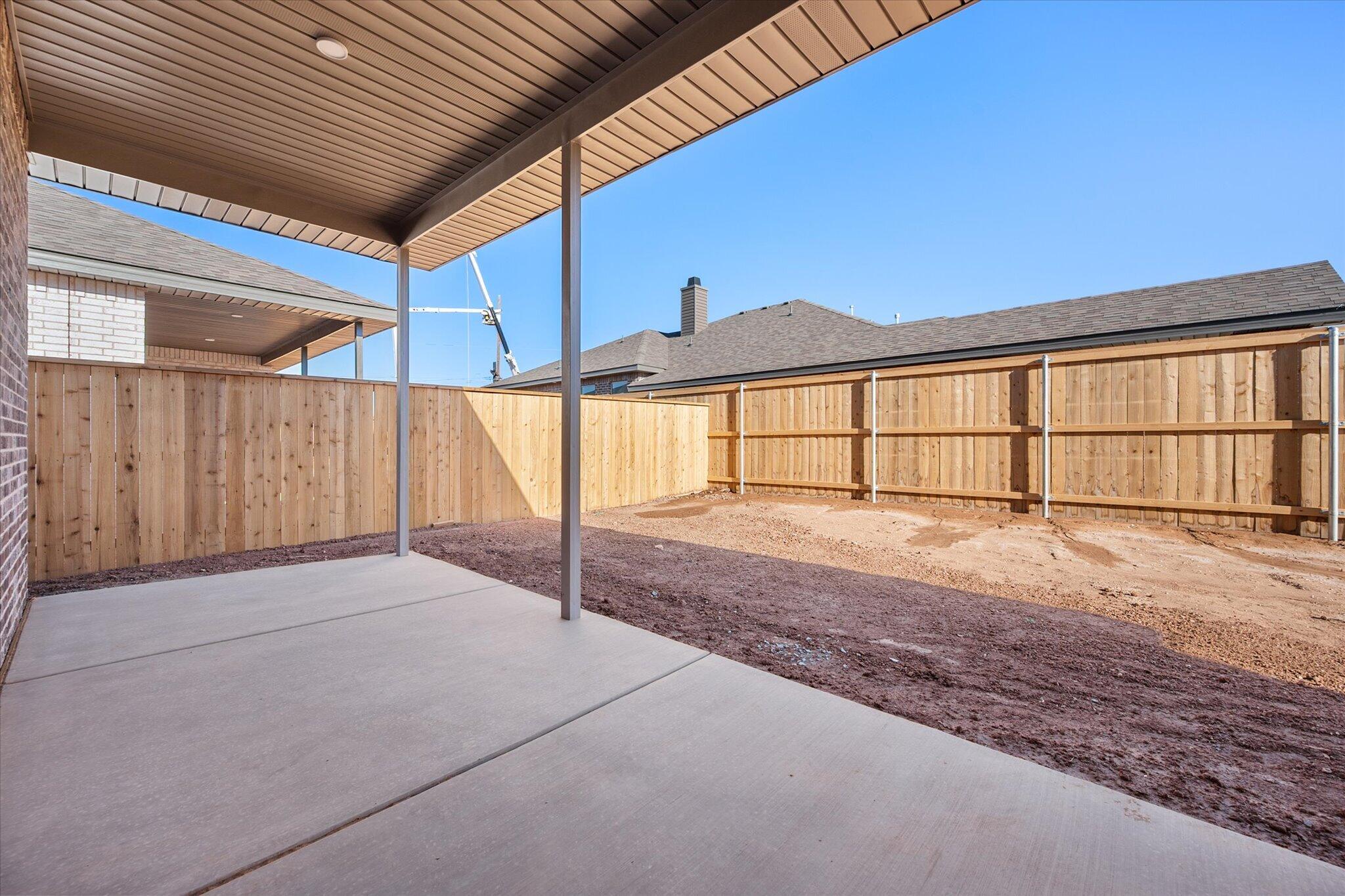 6927 53rd Street Lubbock, TX 79407 - Photo 21 of 21 a view of a backyard of a house