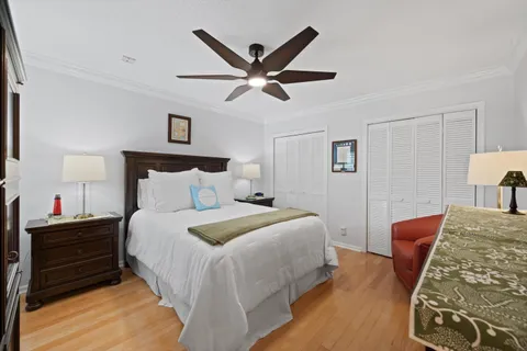 a bedroom with bed and window