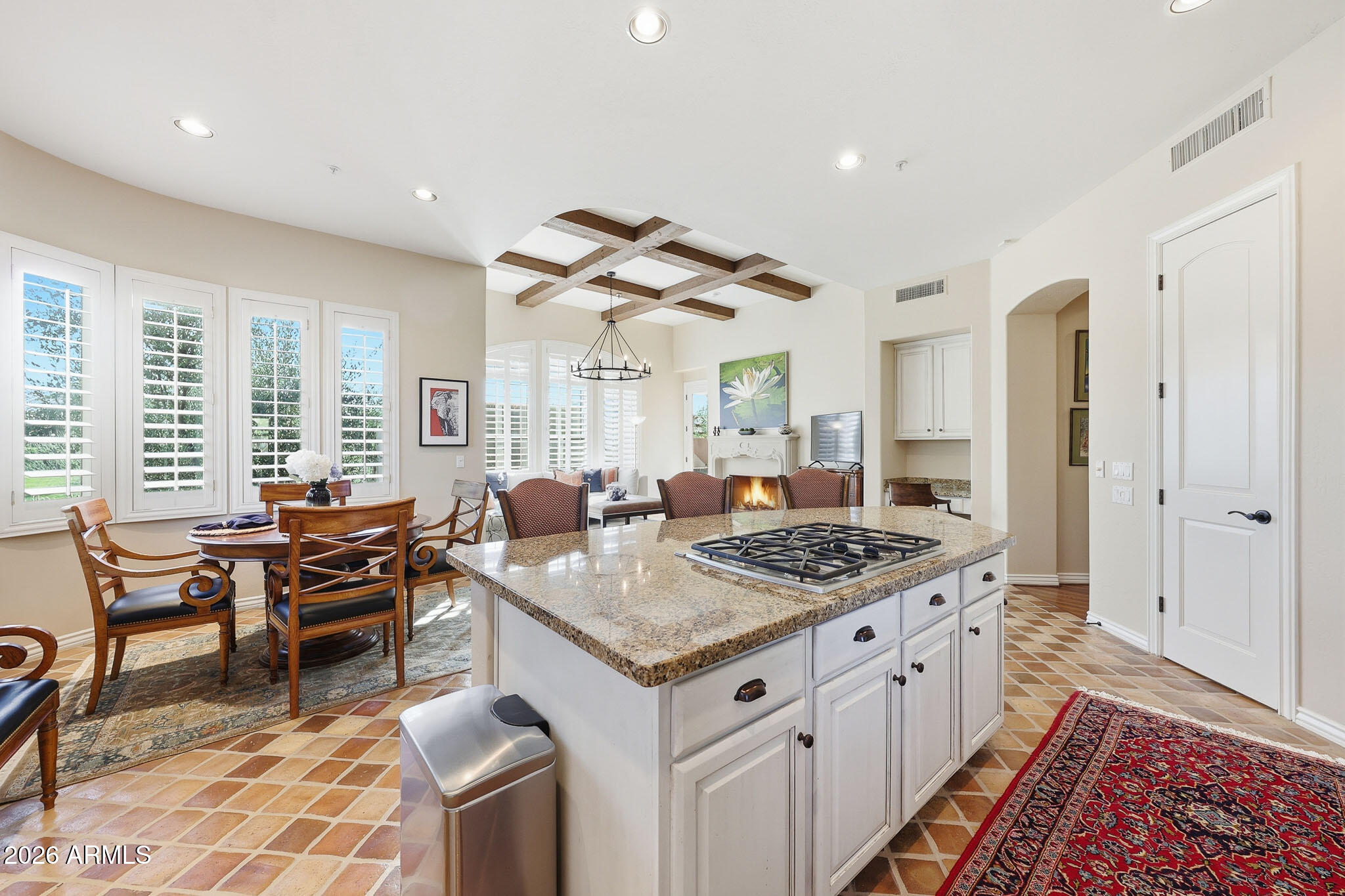 8891 East Mountain Spring Road Scottsdale, AZ 85255 - Photo 12 of 33 a open kitchen with stainless steel appliances granite countertop a stove and a center island