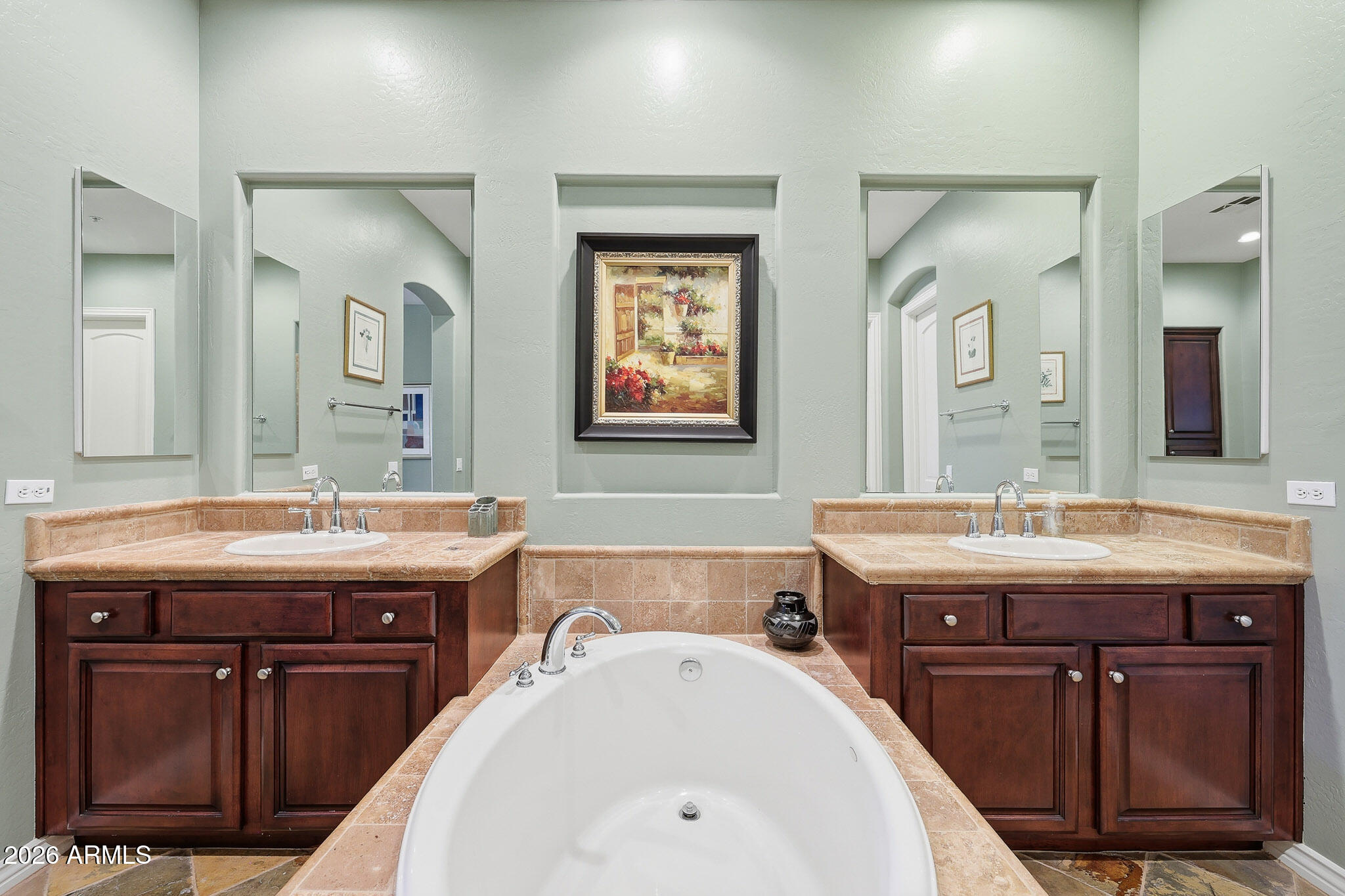 8891 East Mountain Spring Road Scottsdale, AZ 85255 - Photo 19 of 33 a bathroom with a granite countertop sink a mirror and a bathtub