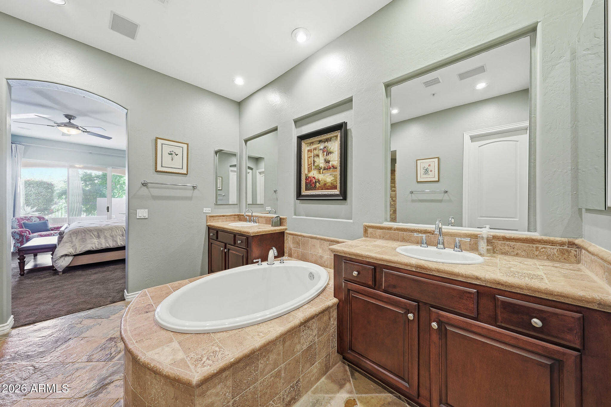 8891 East Mountain Spring Road Scottsdale, AZ 85255 - Photo 21 of 33 a bathroom with a granite countertop sink mirror vanity and toilet