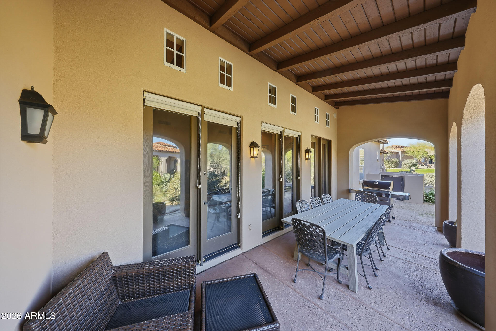 8891 East Mountain Spring Road Scottsdale, AZ 85255 - Photo 31 of 33 a dining room with furniture and wooden floor