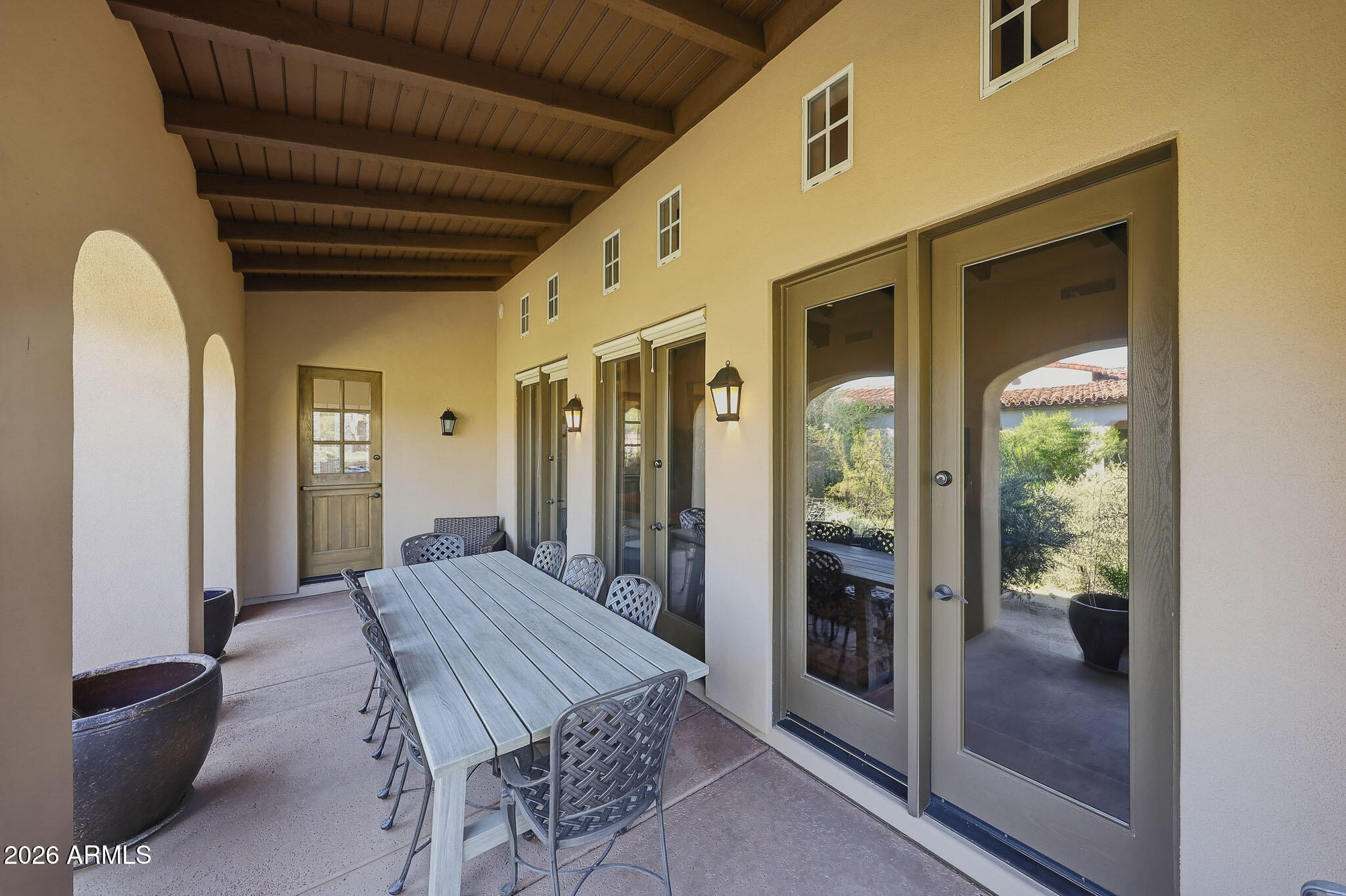 8891 East Mountain Spring Road Scottsdale, AZ 85255 - Photo 32 of 33 a very nice looking room with a large window and chandelier