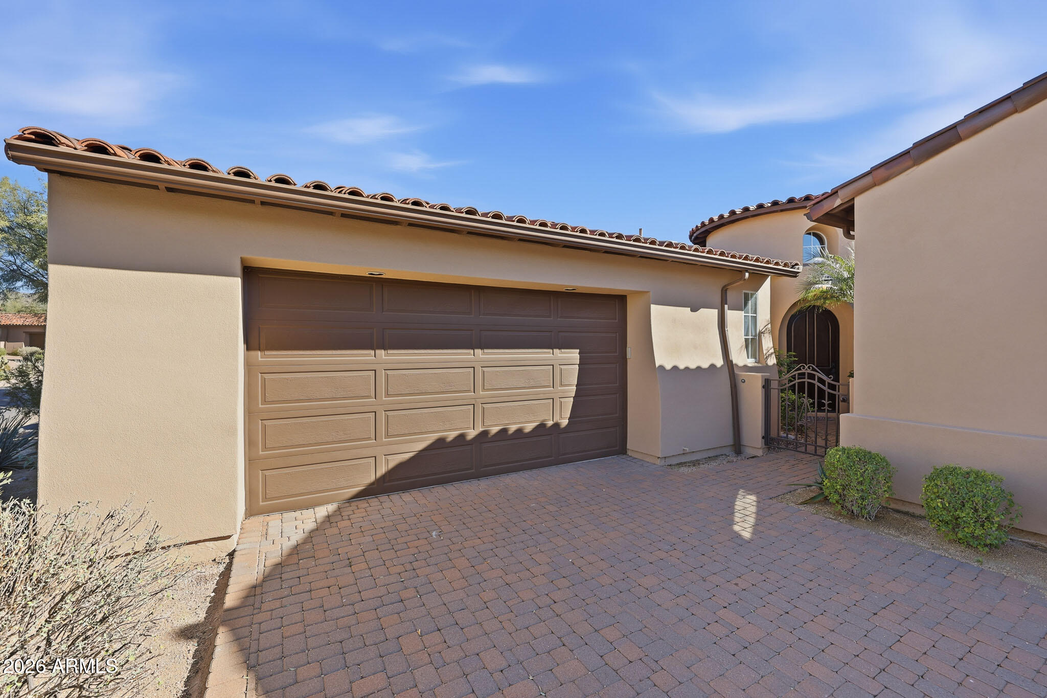 8891 East Mountain Spring Road Scottsdale, AZ 85255 - Photo 33 of 33 front view of a house with a garage