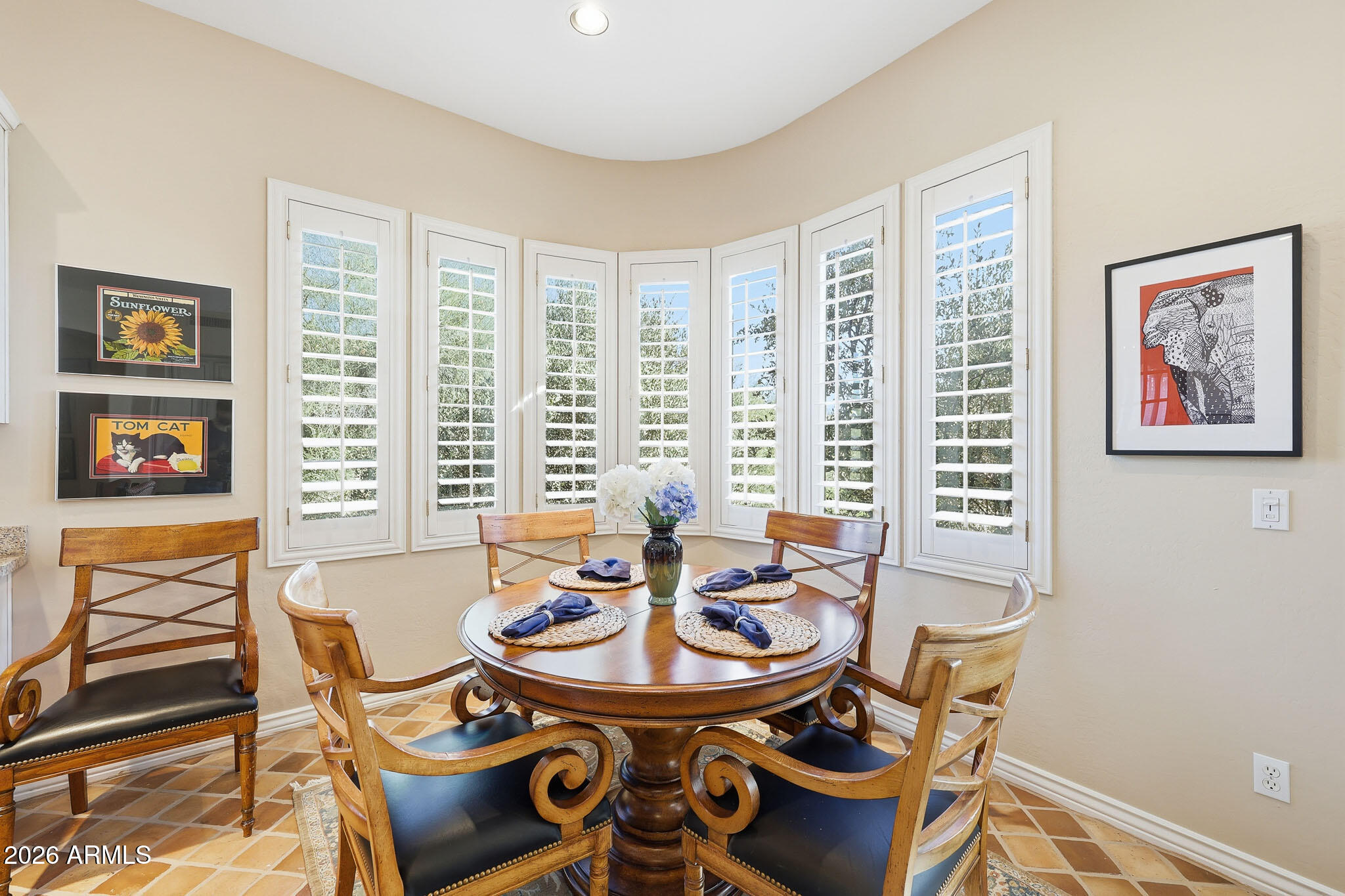 8891 East Mountain Spring Road Scottsdale, AZ 85255 - Photo 10 of 33 a view of a dining room with furniture window and outside view