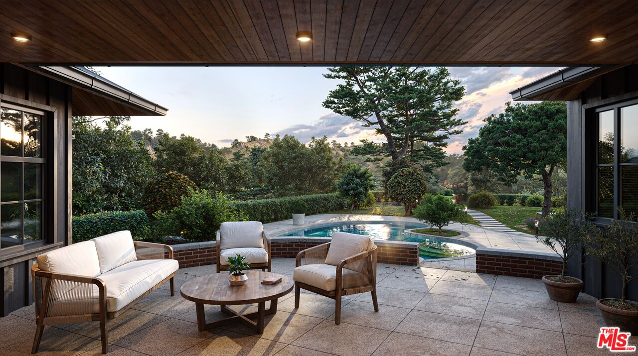 9595 Lime Orchard Road Beverly Hills, CA 90210 - Photo 5 of 12 a view of a patio filled with furniture