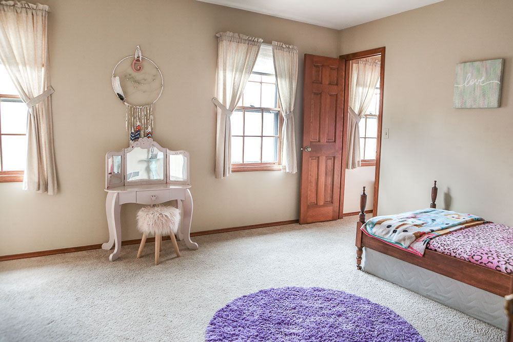 913 Lewis Road Geneva, IL 60134 - Photo 14 of 25 a bedroom with a bed and a window