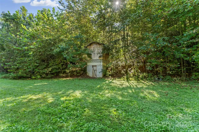 a fire hydrant in the middle of a field