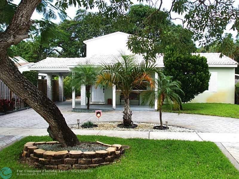 Exterior Front. Tucked away on a quiet street in Tarpon River is this wonderful 3 bedroom 3 bath single family home.