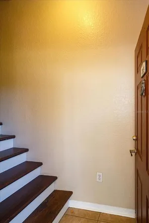 a view of room with wooden floor