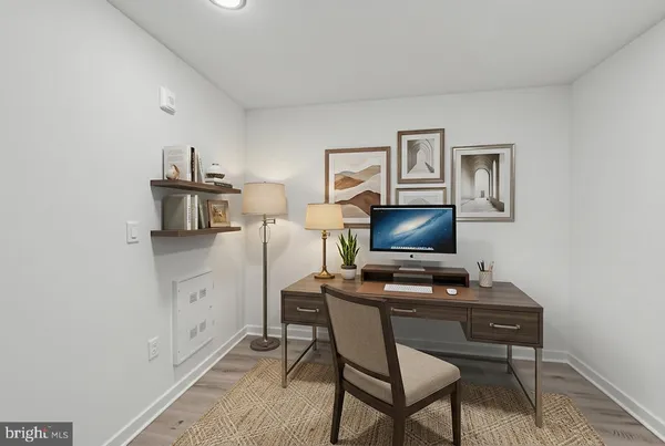 a room with furniture and a flat screen tv