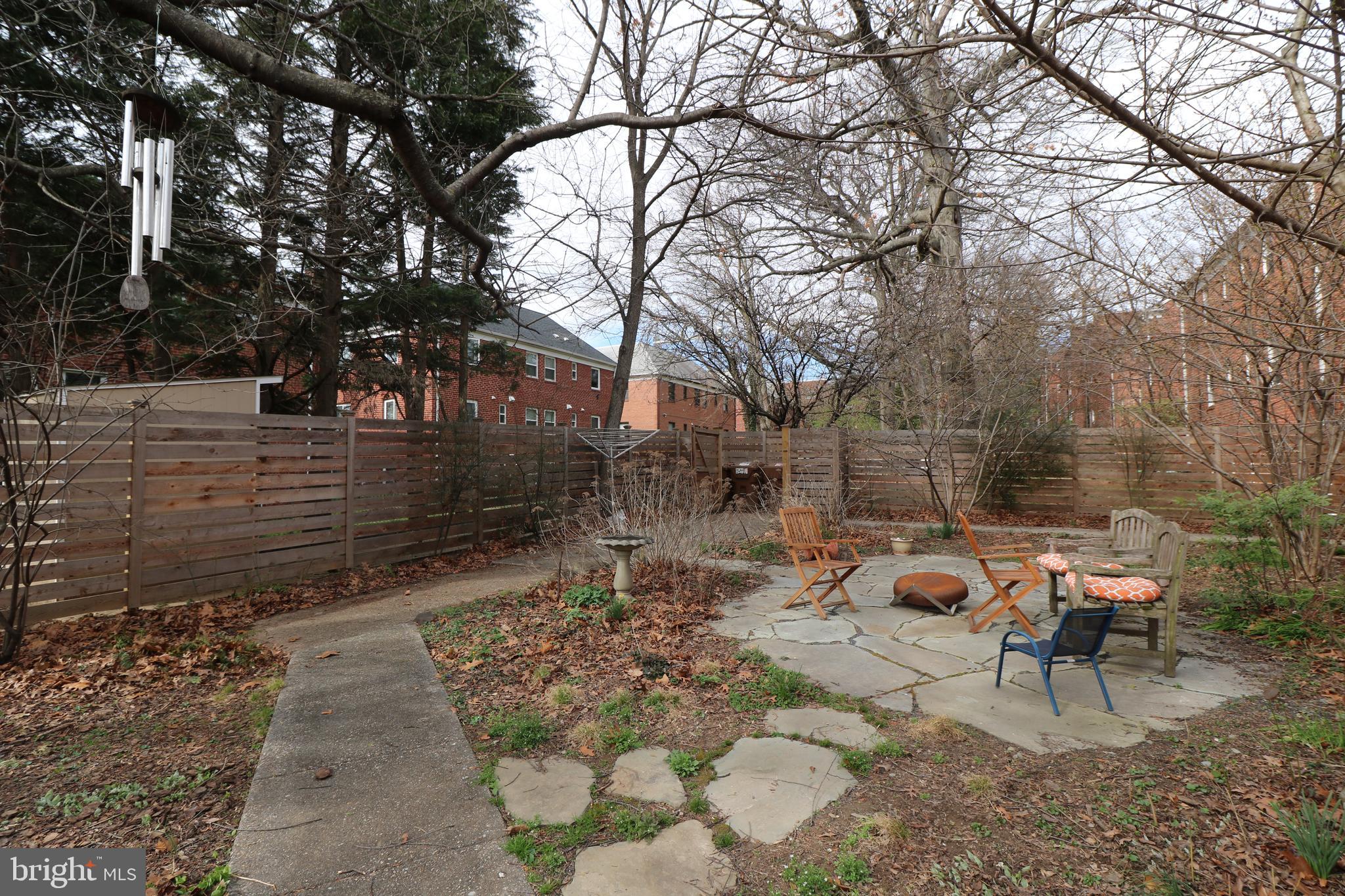 8708 Bradford Road, Unit 201 Silver Spring, MD 20901 - Photo 24 of 34 Lovely common patio, garden and firepit for buildi