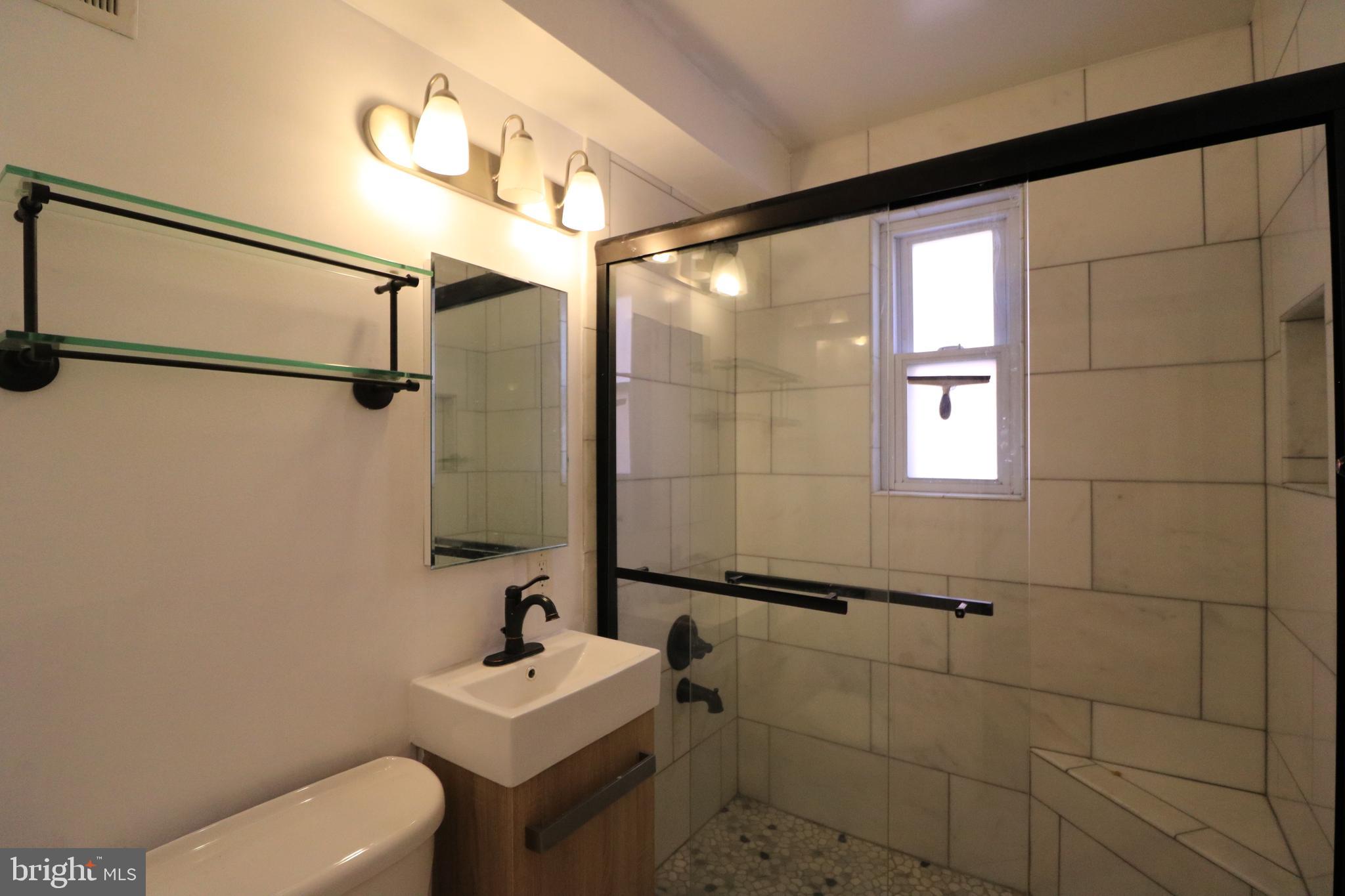8708 Bradford Road, Unit 201 Silver Spring, MD 20901 - Photo 4 of 34 Updated Bathroom
