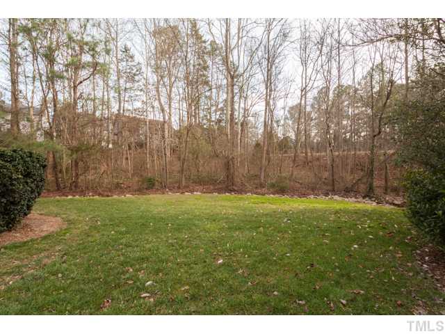 4521 Hershey Court Raleigh, NC 27613 - Photo 21 of 24 a view of a backyard with large trees
