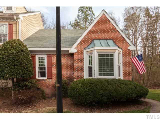 4521 Hershey Court Raleigh, NC 27613 - Photo 24 of 24 a view of a brick house with large windows