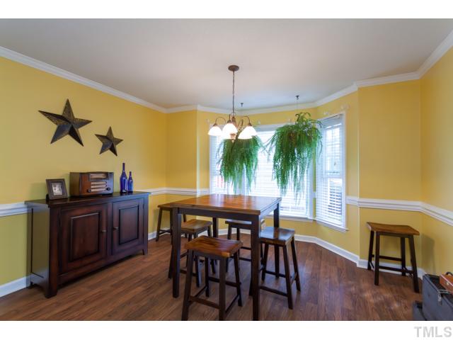 4521 Hershey Court Raleigh, NC 27613 - Photo 9 of 24 a view of a dining room with furniture and window