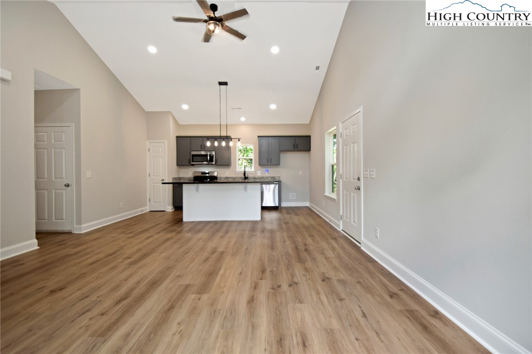 598 Running Deer Trail Boone, NC 28607 - Photo 11 of 49 a view of kitchen with sink microwave and refrigerator