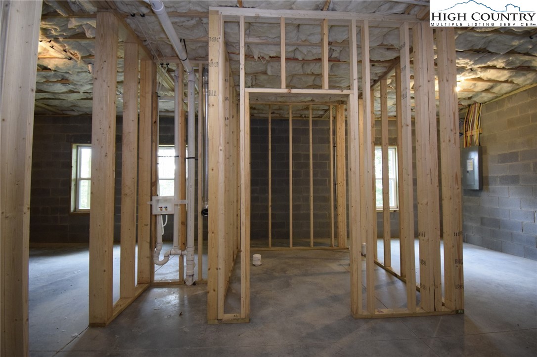 598 Running Deer Trail Boone, NC 28607 - Photo 38 of 49 a view of a bathroom with glass door