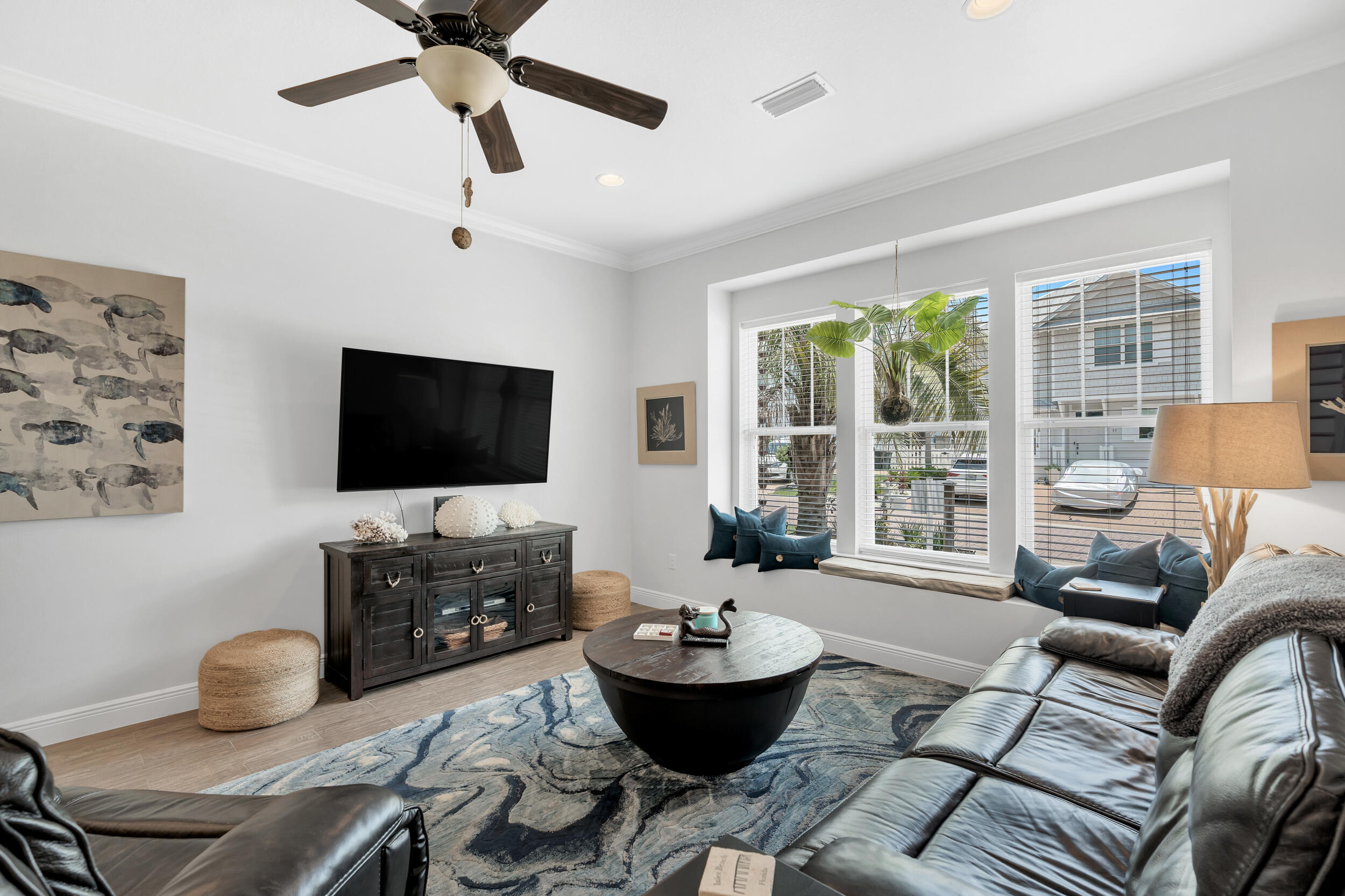 38 Inlet Cove Inlet Beach, FL 32461 - Photo 19 of 51 a living room with furniture and a flat screen tv
