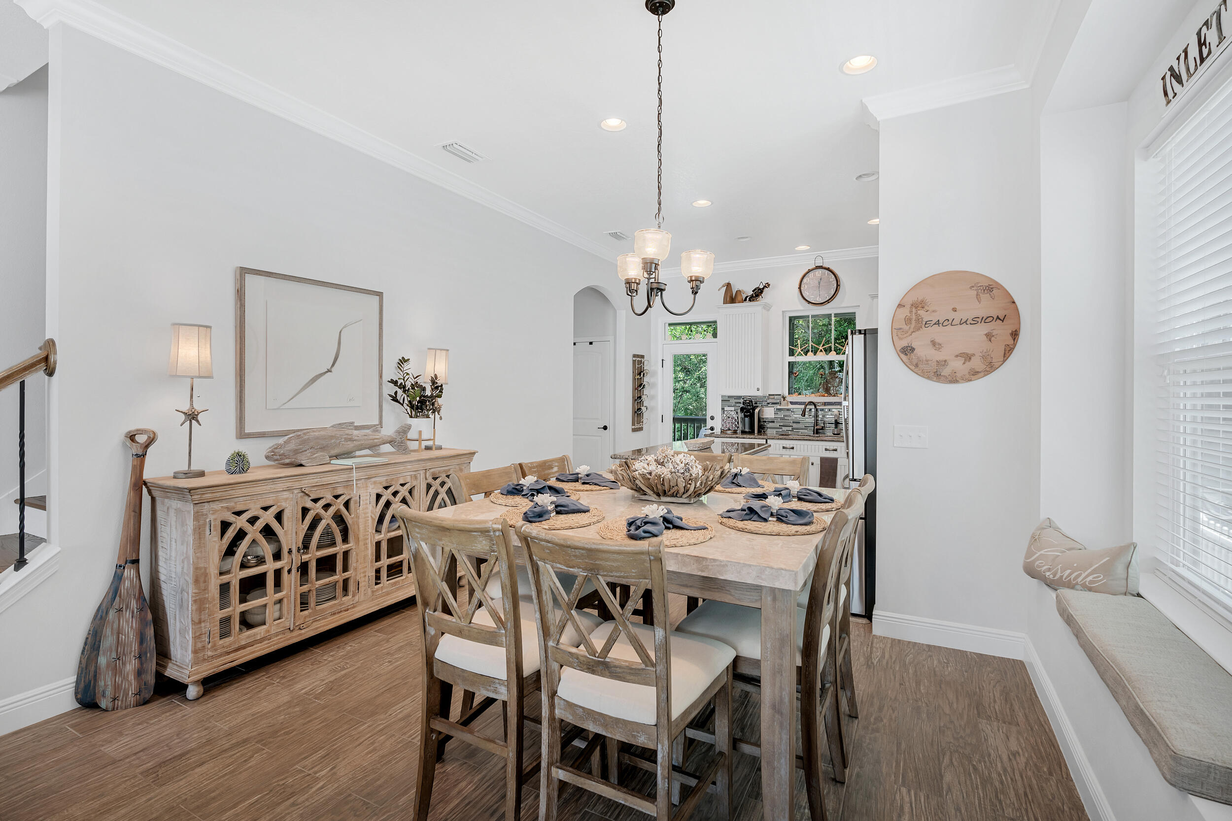 38 Inlet Cove Inlet Beach, FL 32461 - Photo 24 of 51 a view of a dining room and chandelier