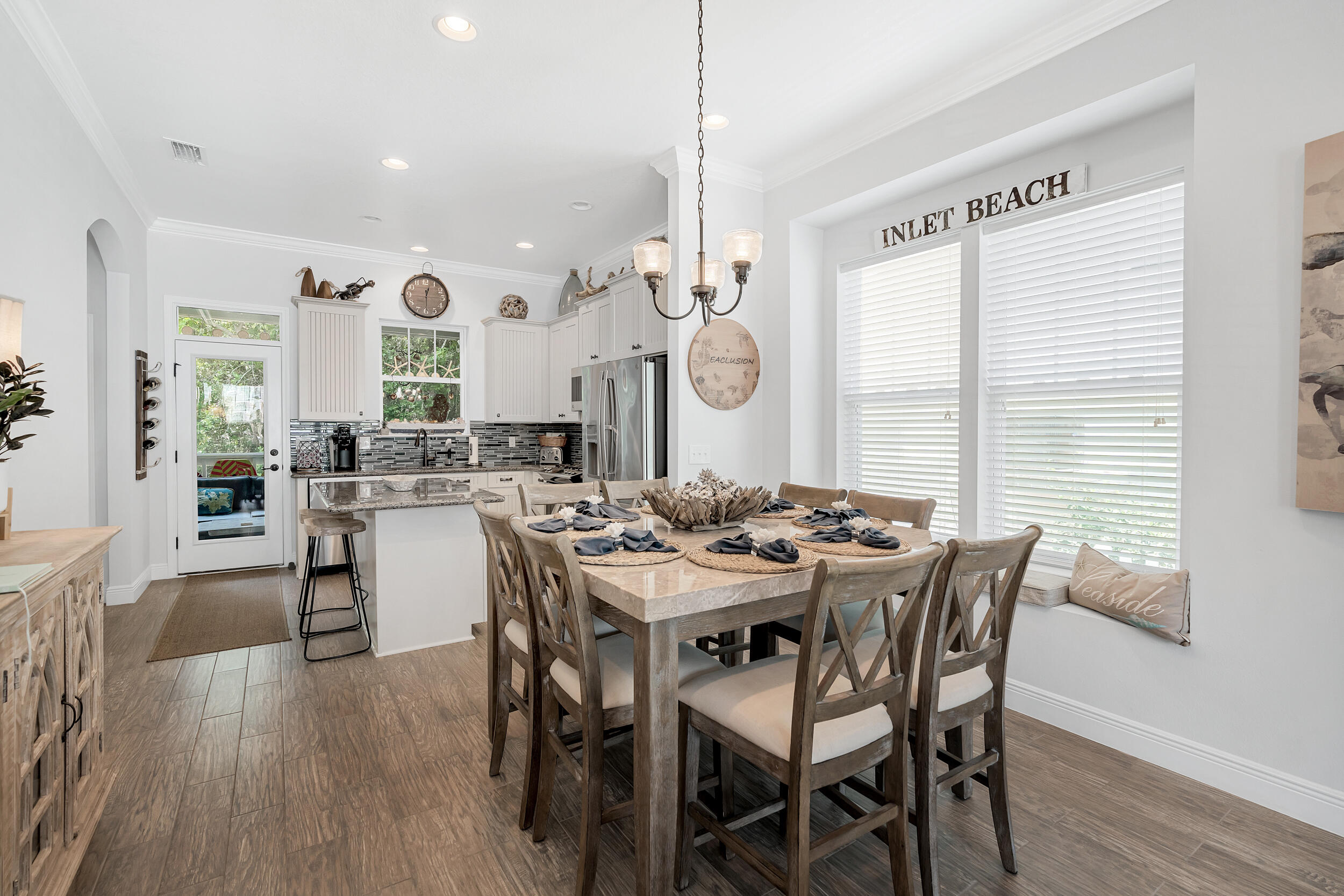 38 Inlet Cove Inlet Beach, FL 32461 - Photo 25 of 51 a view of a dining room with furniture and wooden floor