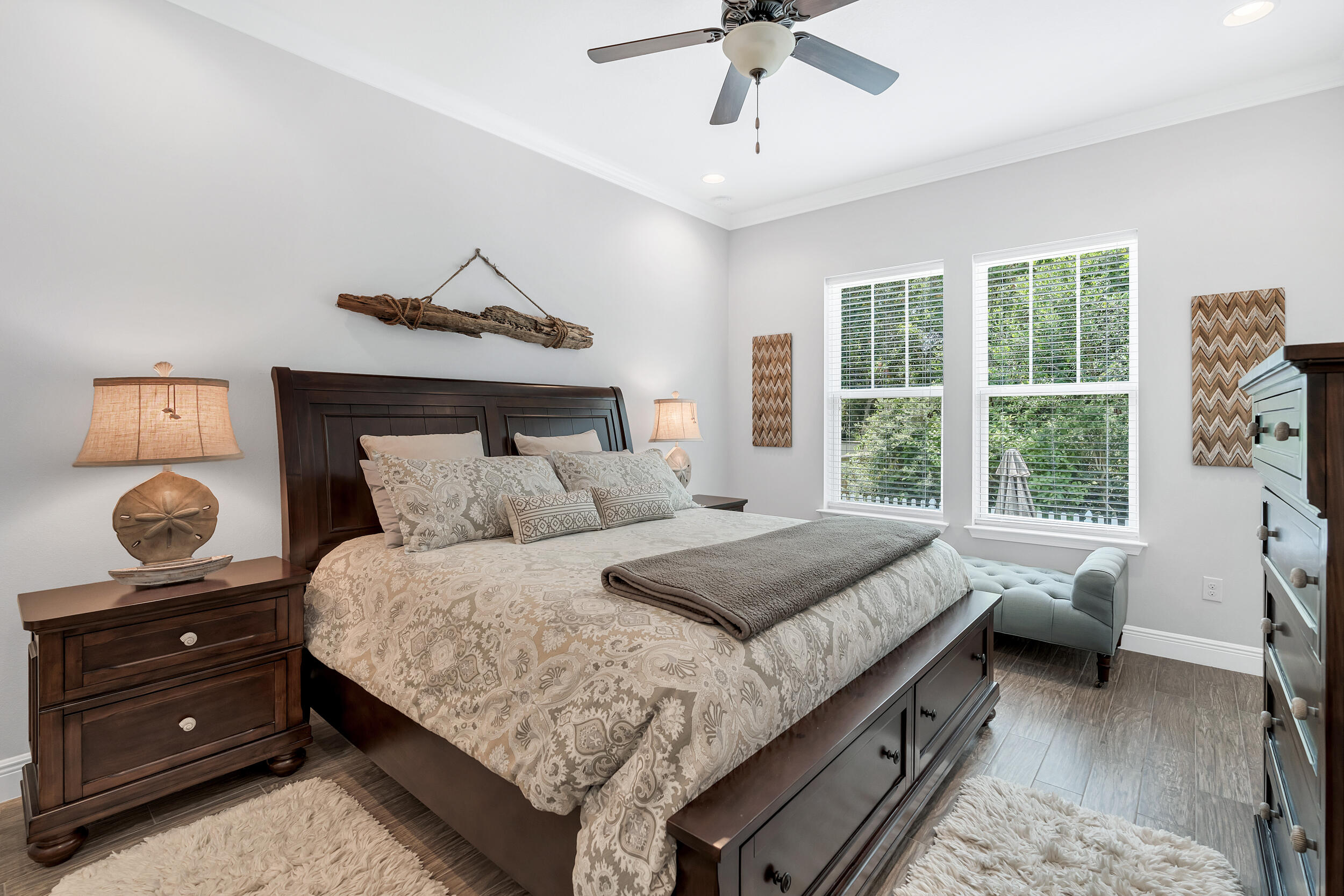 38 Inlet Cove Inlet Beach, FL 32461 - Photo 32 of 51 a bedroom with a bed and wooden floor