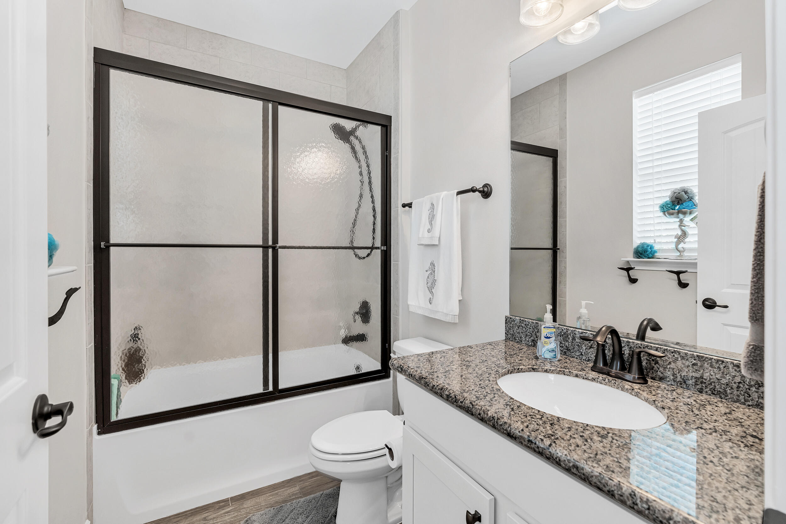 38 Inlet Cove Inlet Beach, FL 32461 - Photo 40 of 51 a bathroom with a granite countertop sink mirror vanity and toilet