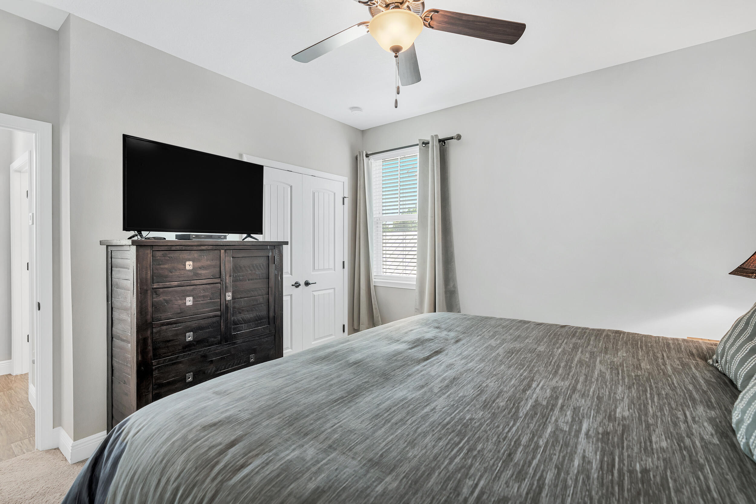 38 Inlet Cove Inlet Beach, FL 32461 - Photo 41 of 51 a bedroom with a bed and a flat screen tv