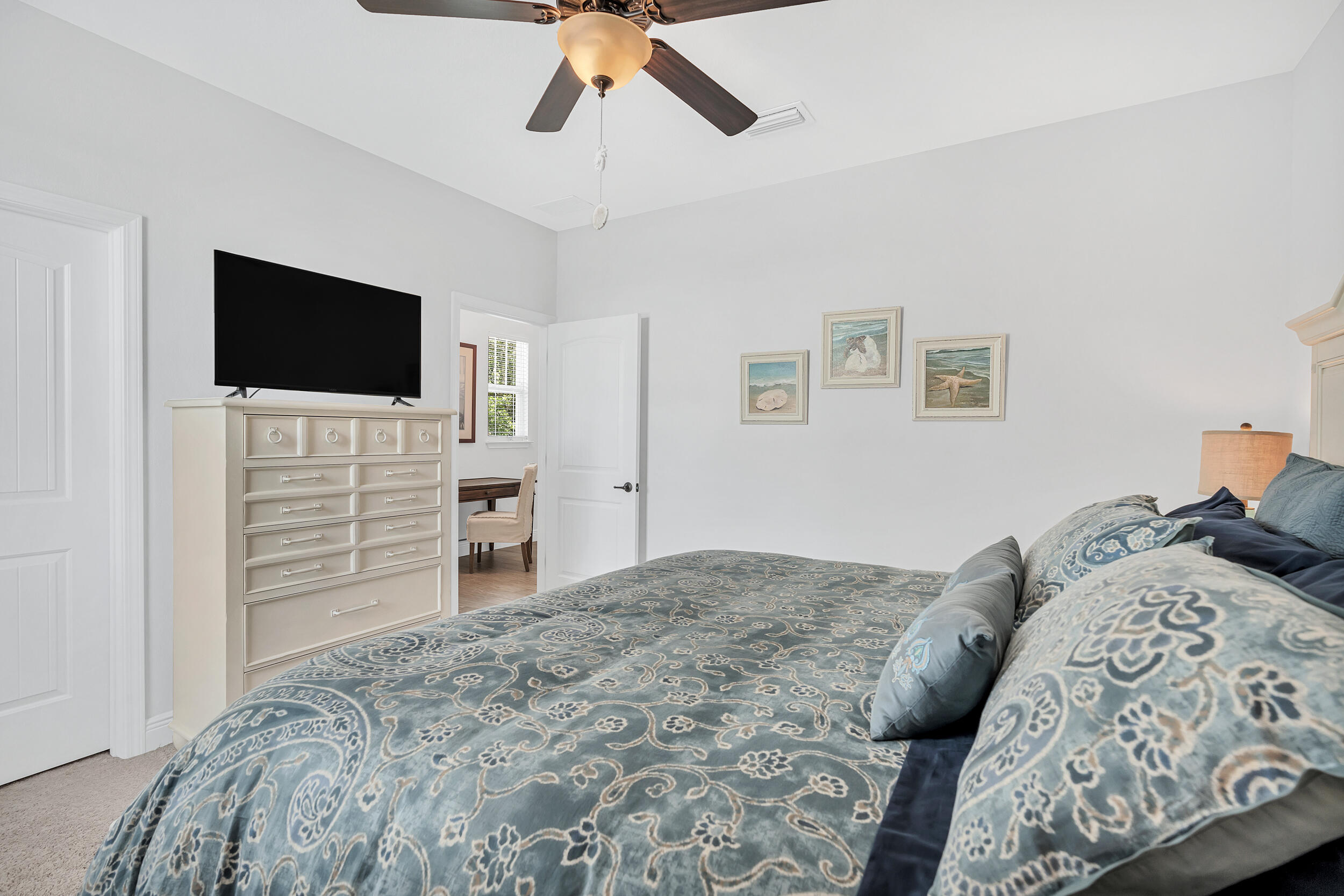 38 Inlet Cove Inlet Beach, FL 32461 - Photo 44 of 51 a bedroom with a bed and a flat screen tv