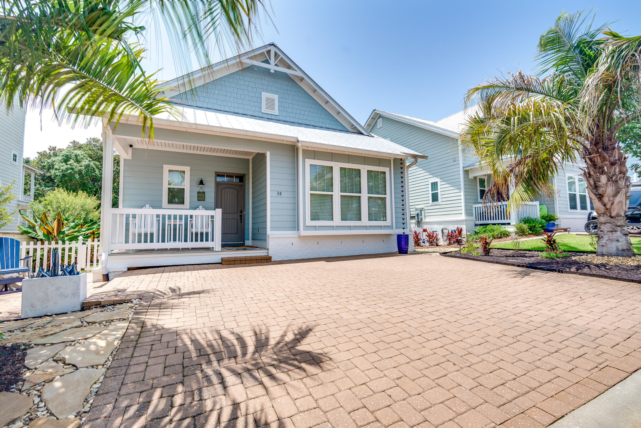 38 Inlet Cove Inlet Beach, FL 32461 - Photo 10 of 51 a house with palm tree in front of it