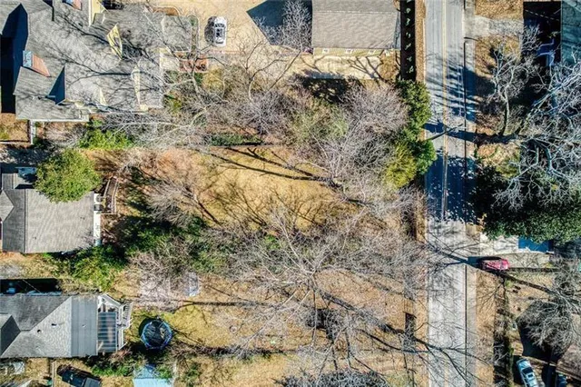 an aerial view of residential house with outdoor space
