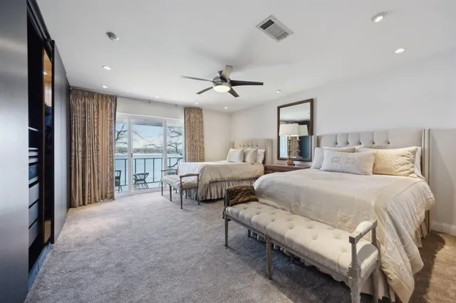 a front view of a building with a ocean view