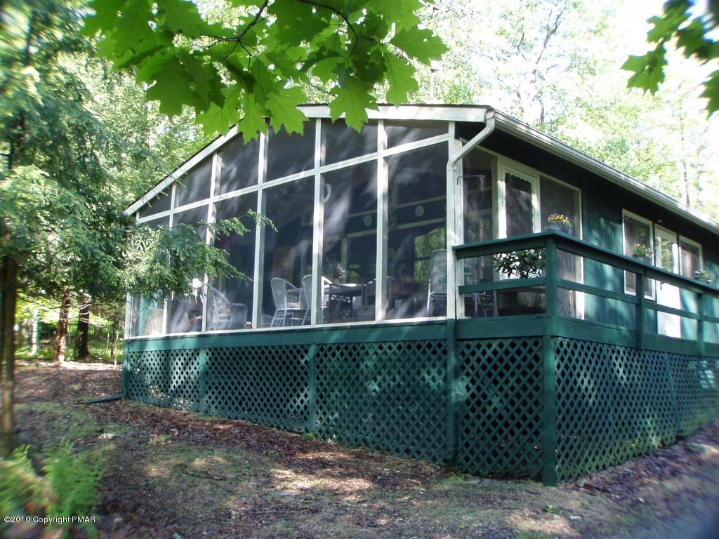 209 Blue Ridge Drive Canadensis, PA 18325 - Photo 2 of 19 Front screened porch