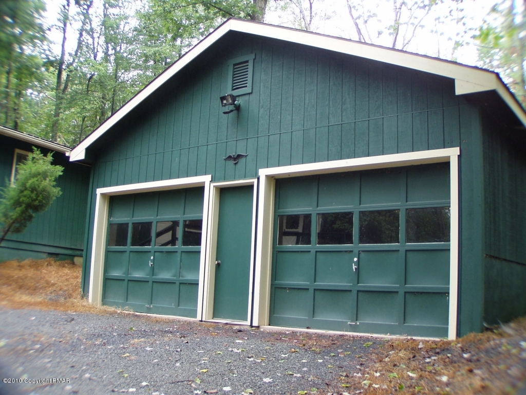 209 Blue Ridge Drive Canadensis, PA 18325 - Photo 3 of 19 2 car garage with storage