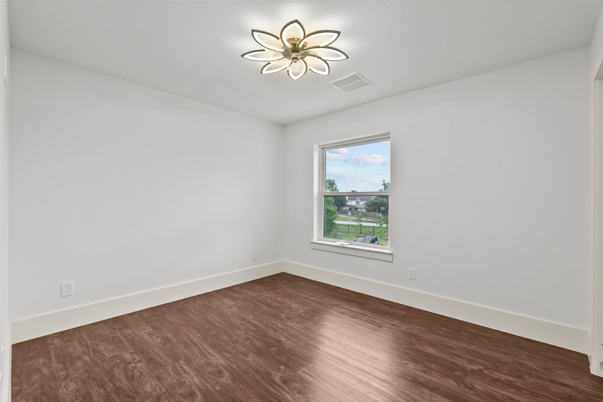 3237 Harkey Road Pearland, TX 77584 - Photo 26 of 46 View of the second of four bedrooms upstairs