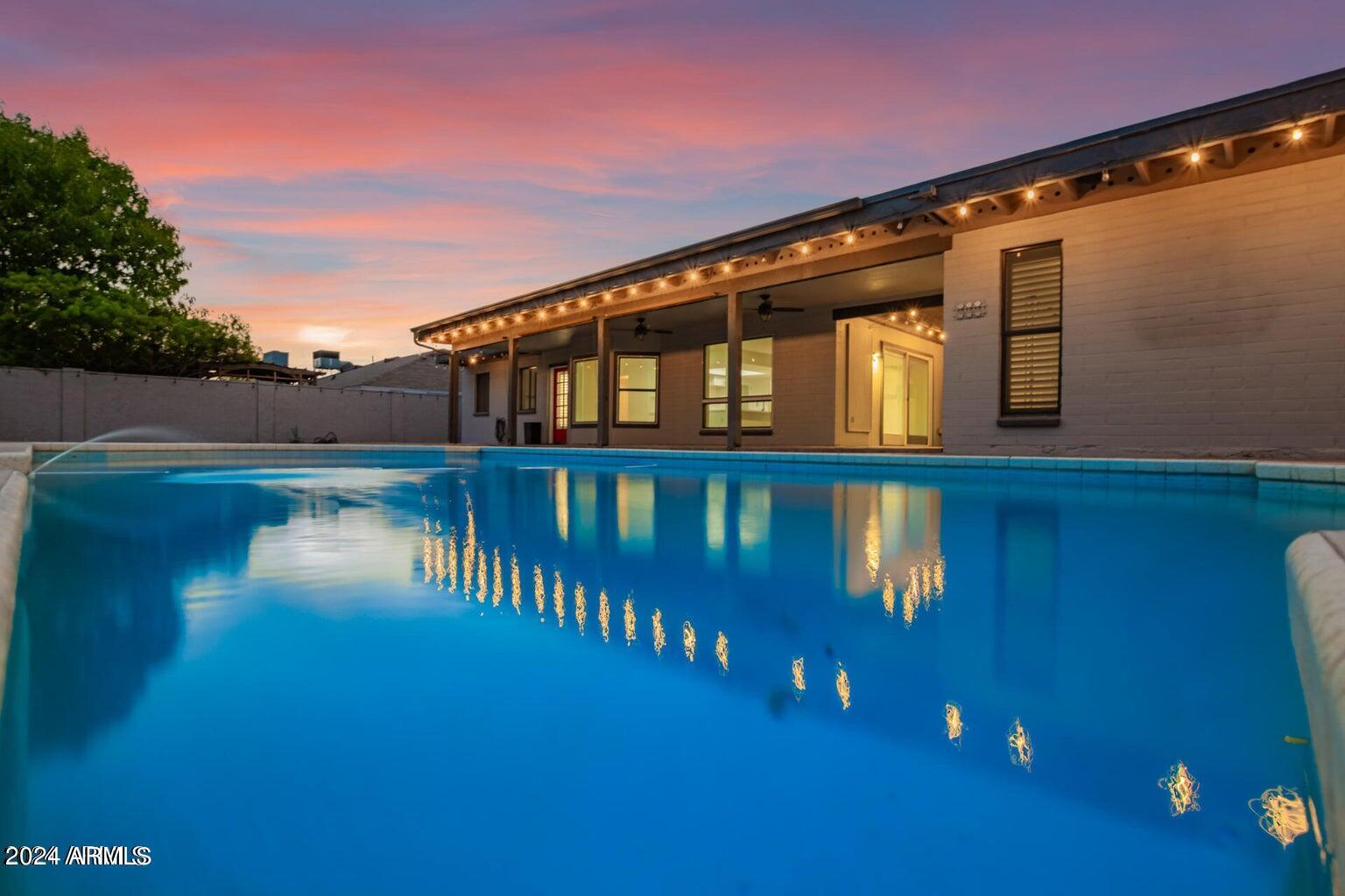 1893 East Bendix Drive Tempe, AZ 85283 - Photo 20 of 45 a front view of a house with a yard