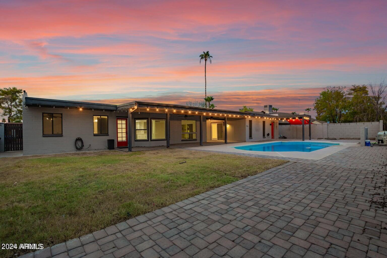 1893 East Bendix Drive Tempe, AZ 85283 - Photo 21 of 45 a view of a house with a yard and potted plants