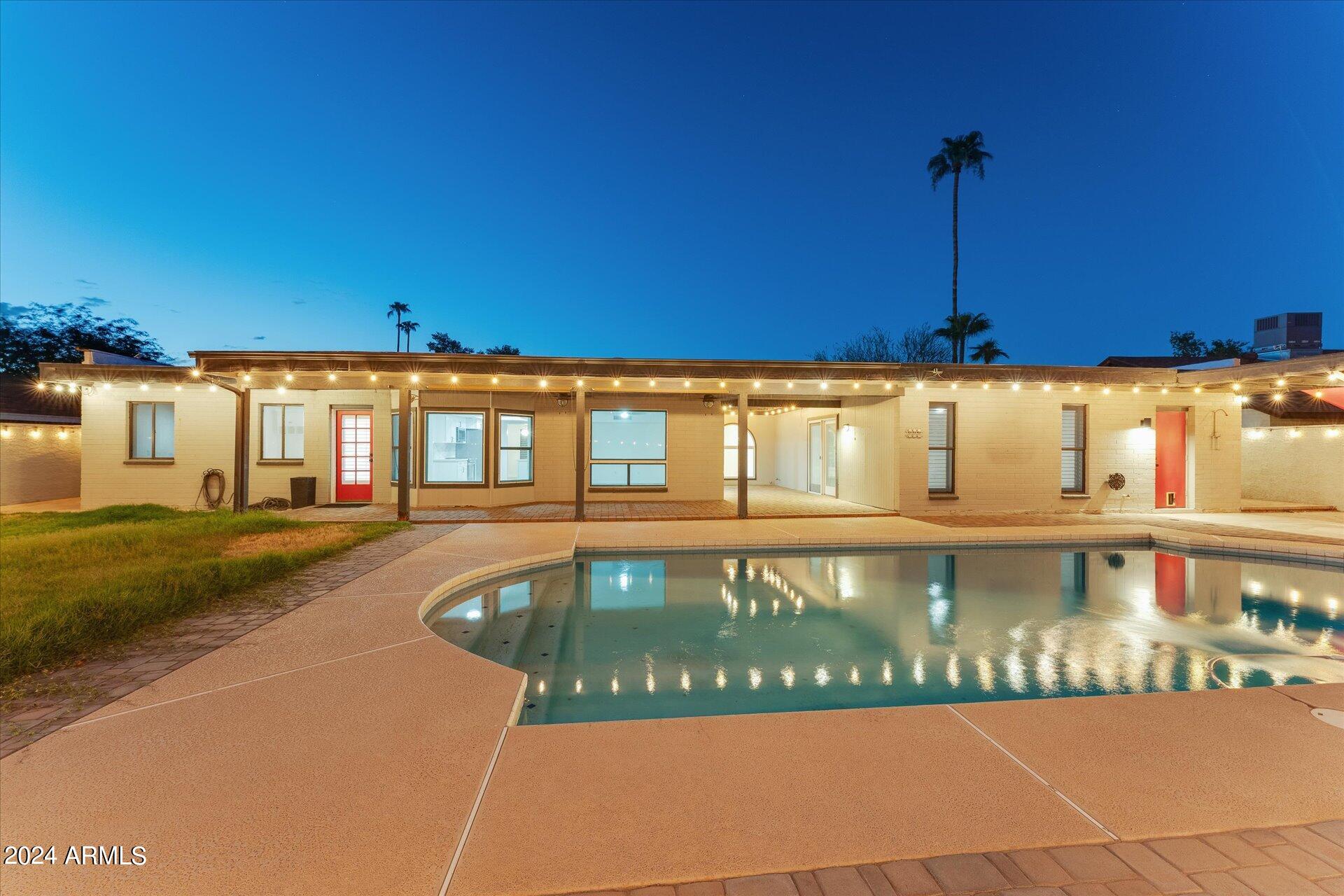 1893 East Bendix Drive Tempe, AZ 85283 - Photo 27 of 45 a front view of a house with a swimming pool