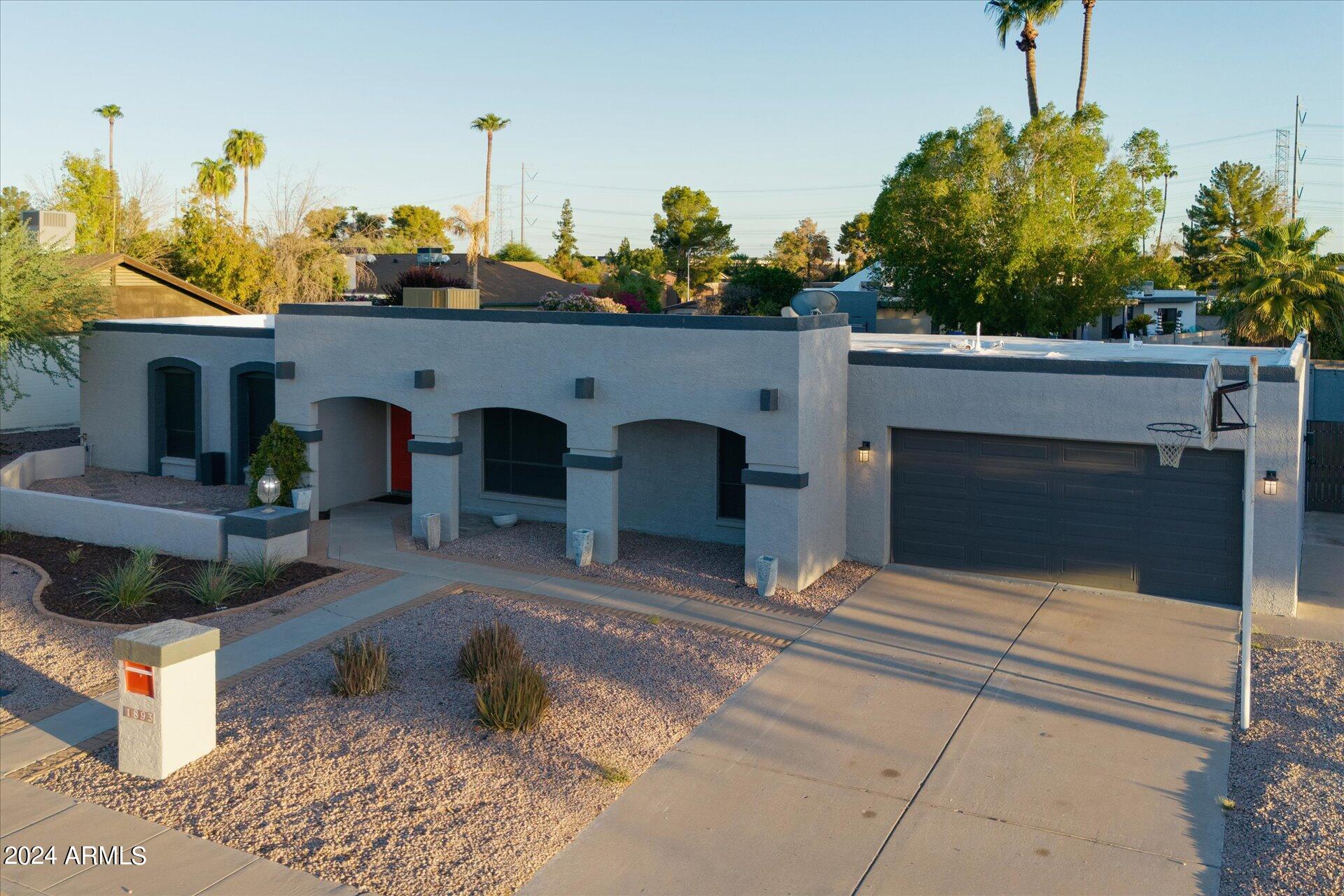 1893 East Bendix Drive Tempe, AZ 85283 - Photo 41 of 45 a living room with furniture and a fireplace