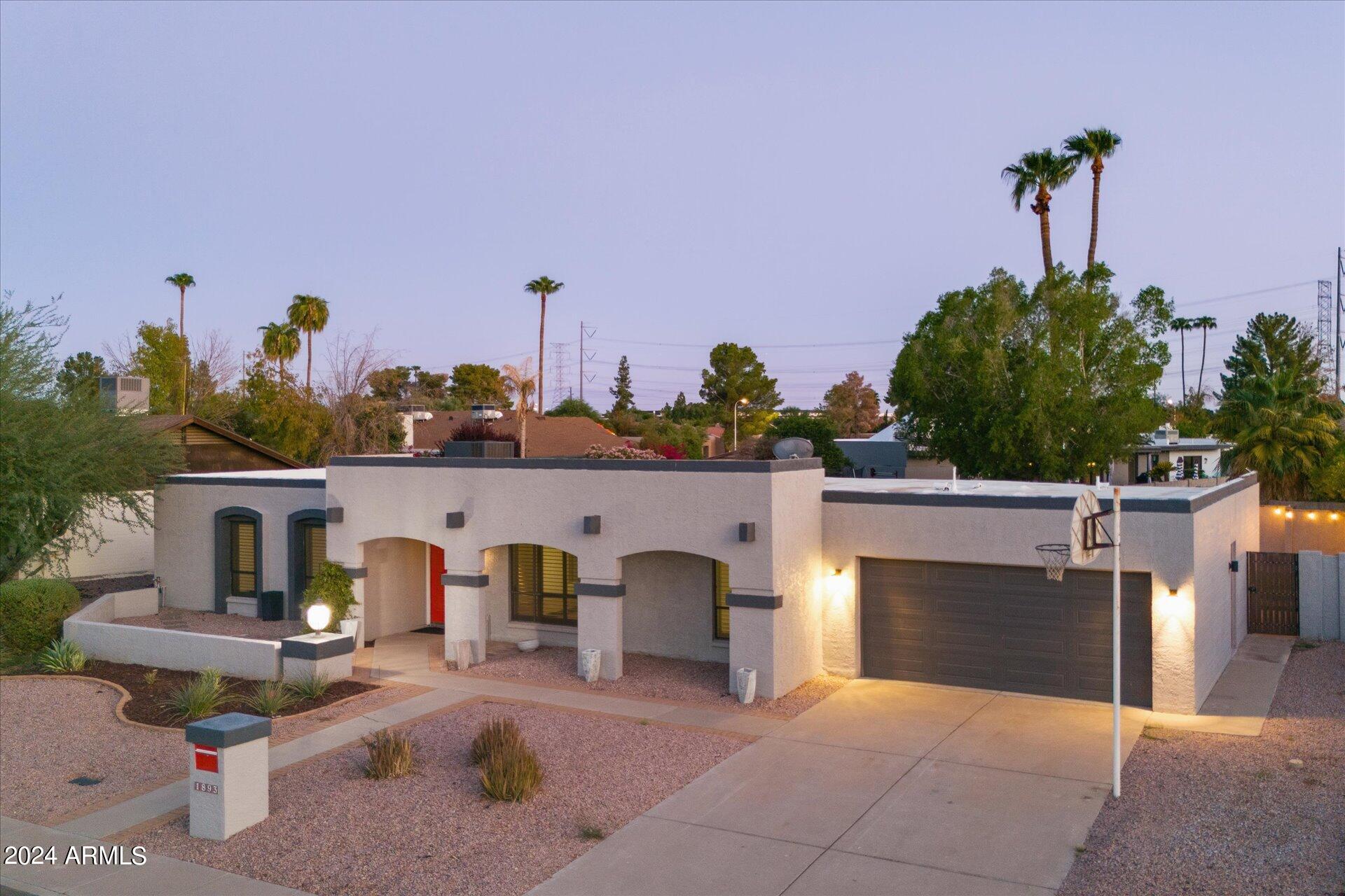 1893 East Bendix Drive Tempe, AZ 85283 - Photo 5 of 45 a view of a patio with table and chairs