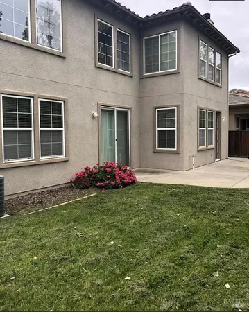 a house view with a garden space