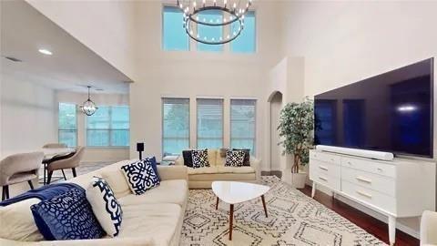 3308 Knoll Pines Road Denton, TX 76208 - Photo 6 of 13 a living room with furniture and a potted plant