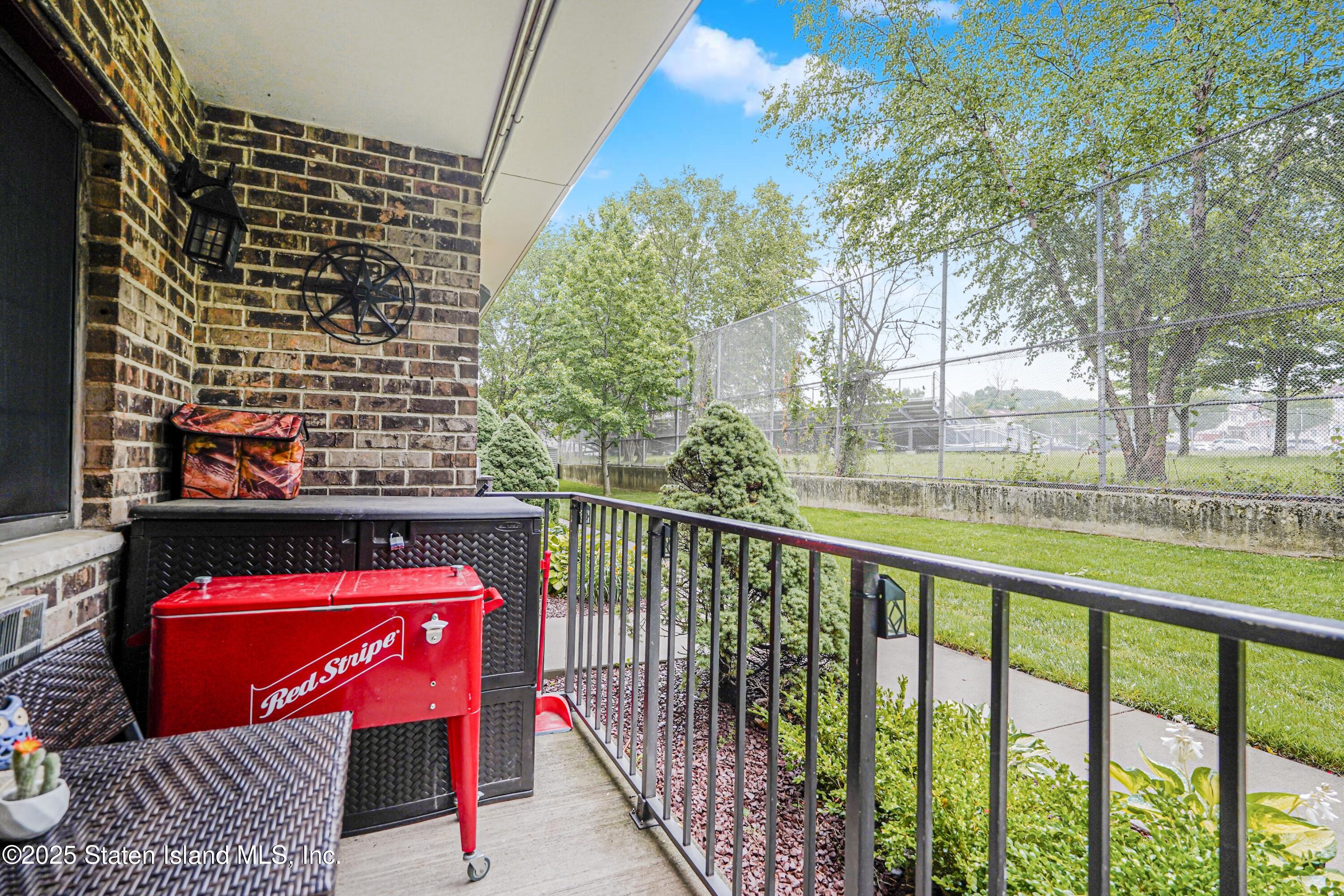 170 Devon Loop, Unit 3 Staten Island, NY 10314 - Photo 19 of 22 a view of a street with an outdoor seating