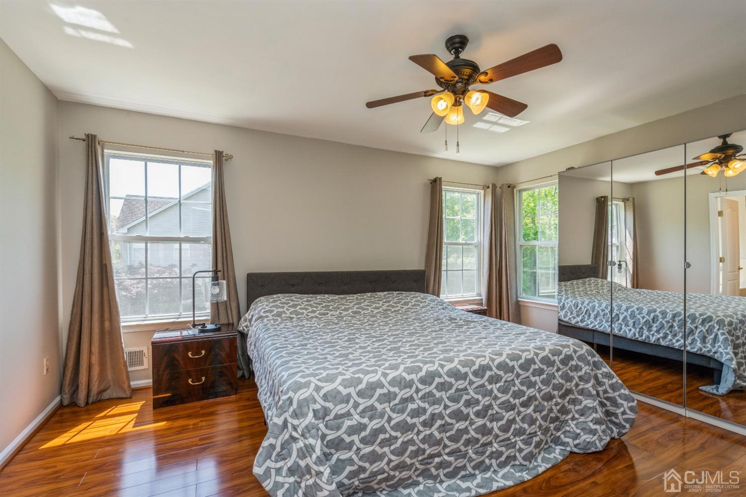 202 Hawthorne Road North Brunswick, NJ 08902 - Photo 11 of 21 a bedroom with a bed and window